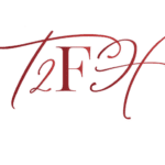 A red and white logo of the t 2 f.